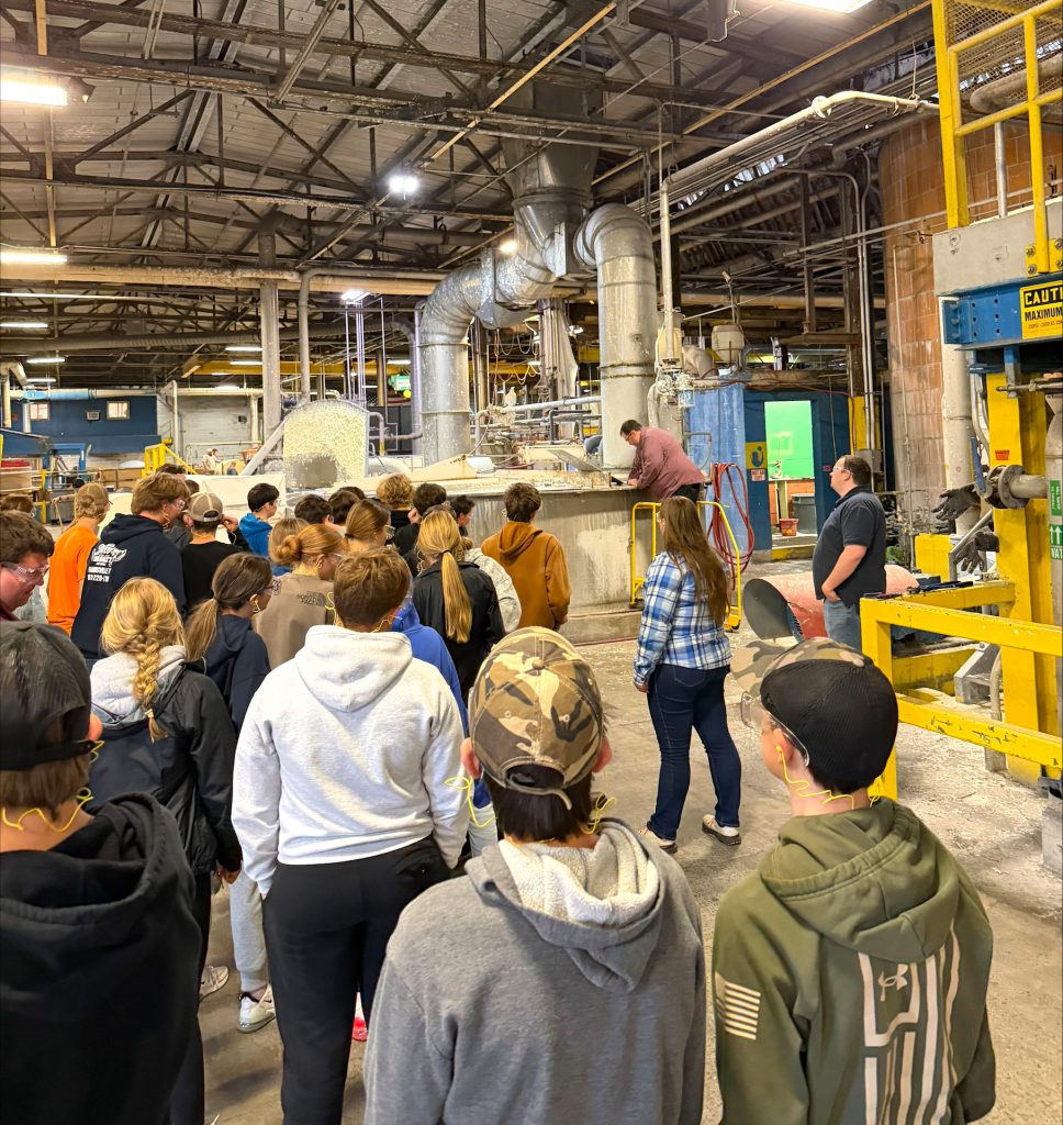 students touring manufacturing plant