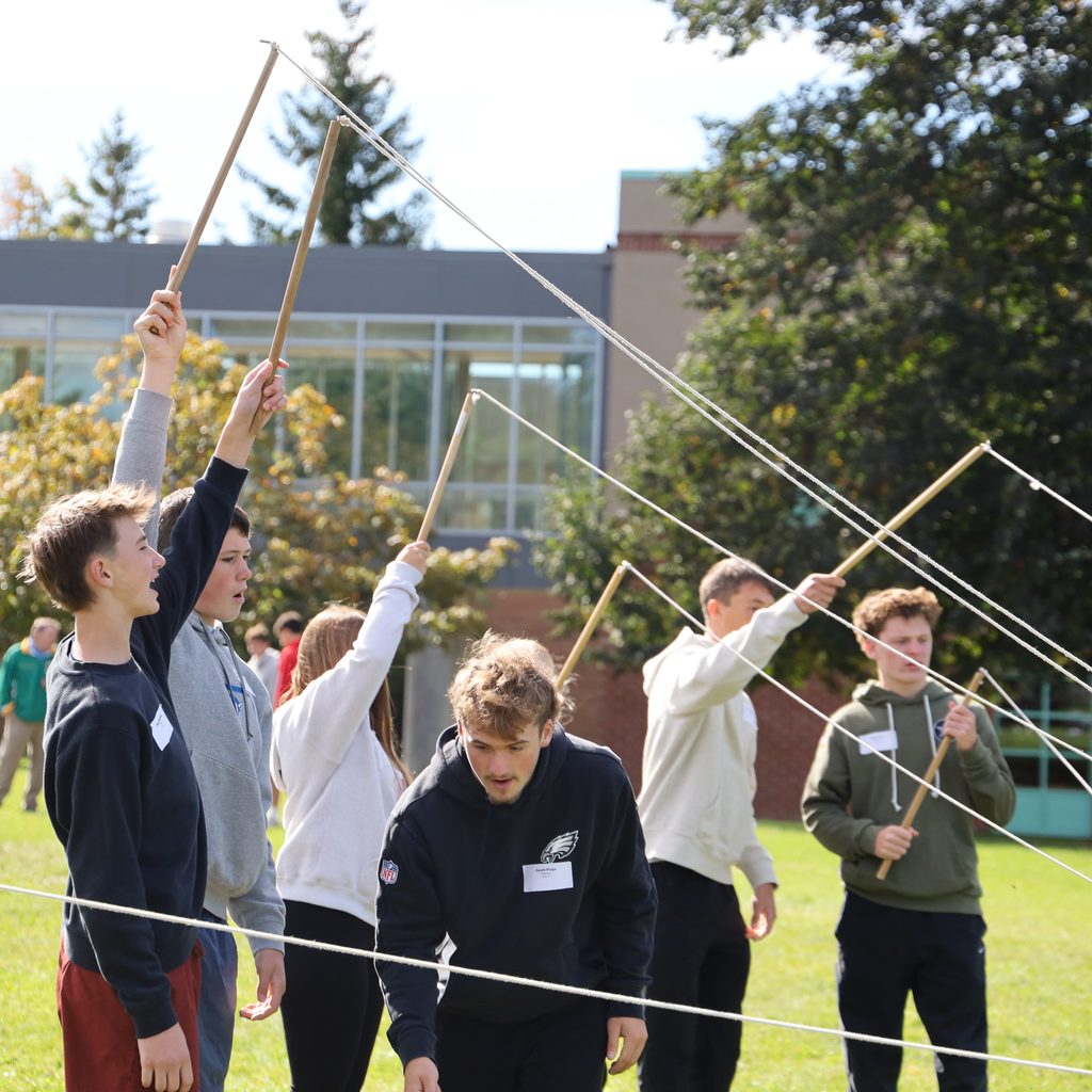 students doing a rope activity